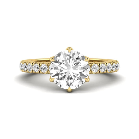 Round cut lab grown diamond pavé solitaire engagement ring with cathedral setting in yellow gold.