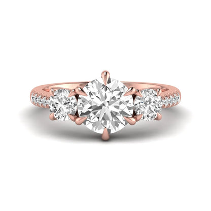 Round cut lab grown diamond three stone engagement ring with two round side diamonds and diamond accented shoulders in rose gold