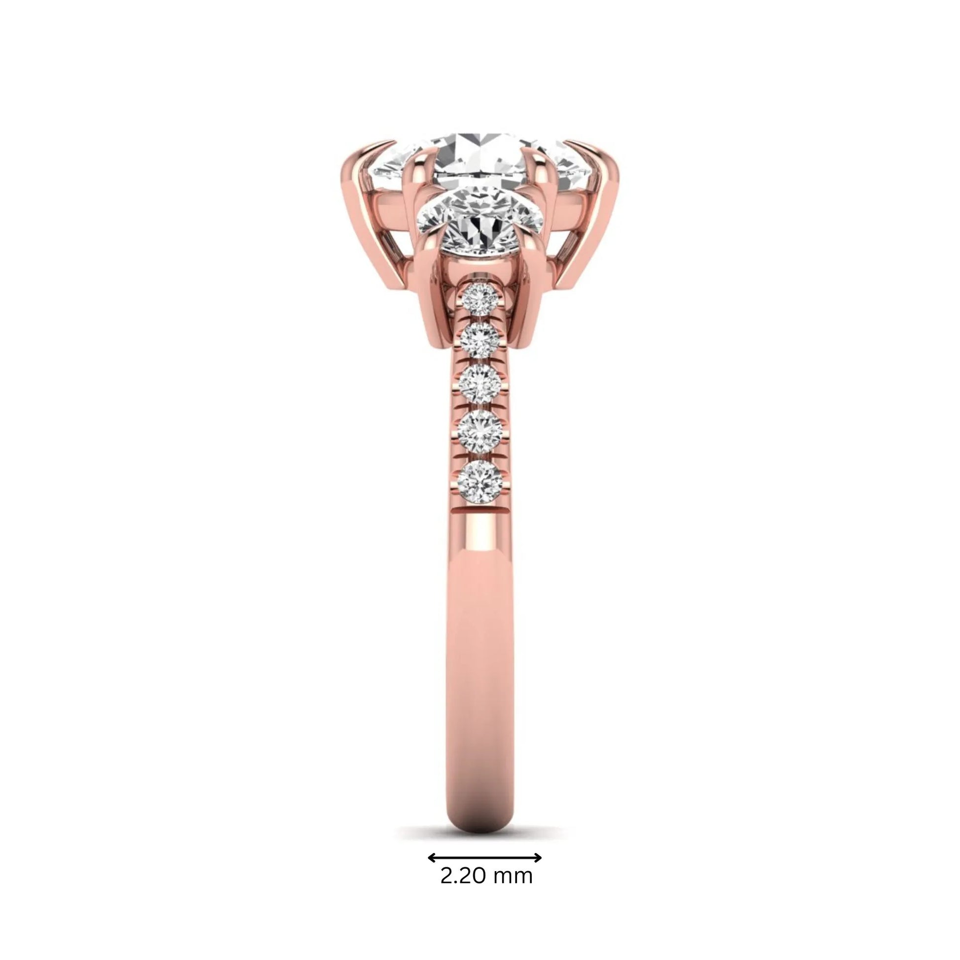 Round cut lab grown diamond three stone engagement ring with two round side diamonds and diamond accented shoulders in rose gold