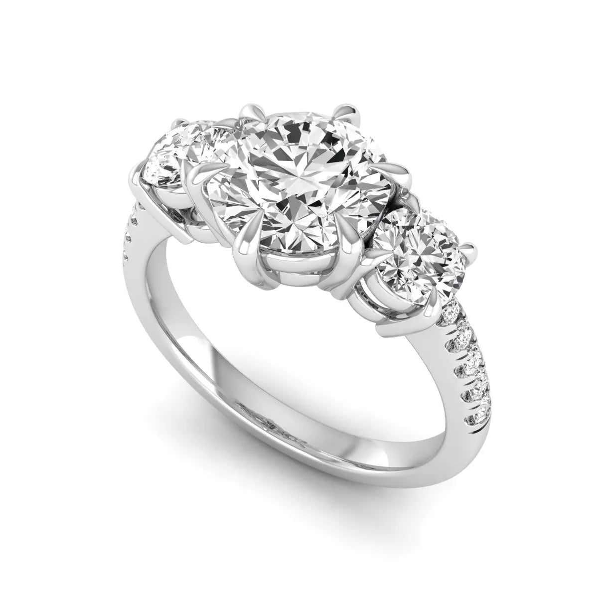 Round cut lab grown diamond three stone engagement ring with two round side diamonds and diamond accented shoulders in white gold