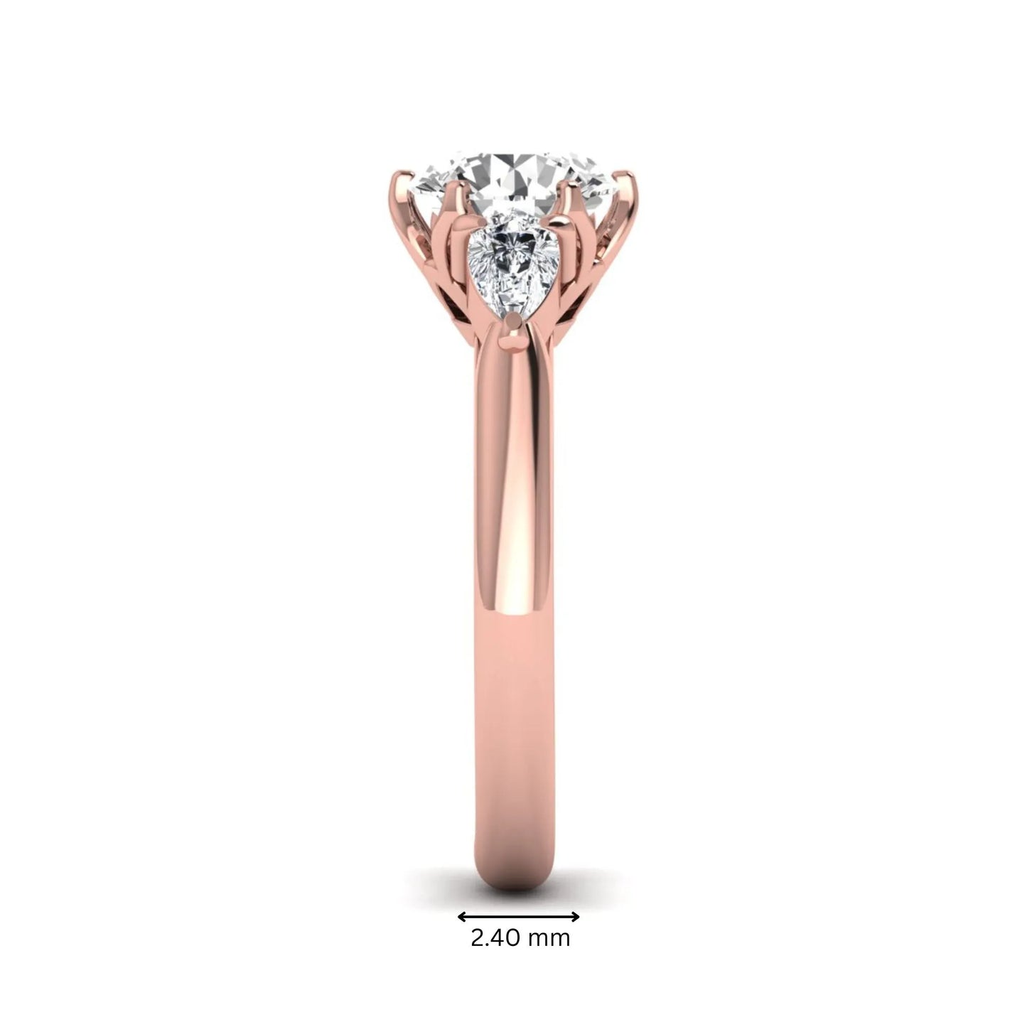 Round cut lab grown diamond three stone engagement ring with pear side diamonds in rose gold.