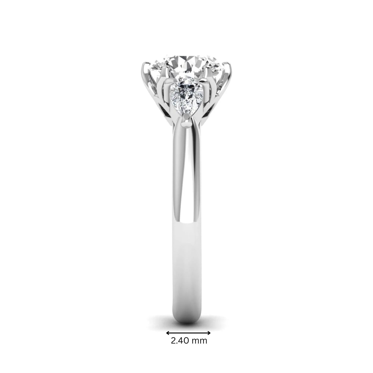 Round cut lab grown diamond three stone engagement ring with pear side diamonds in white gold.