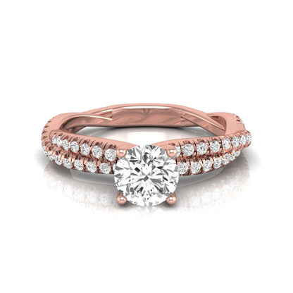 Round cut lab grown diamond engagement ring featuring a twisted pavé diamond shank in rose gold.