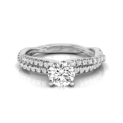 Round cut lab grown diamond engagement ring featuring a twisted pavé diamond shank in white gold.