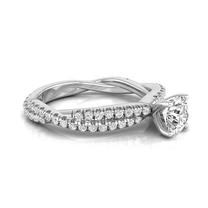 Round cut lab grown diamond engagement ring featuring a twisted pavé diamond shank in white gold.