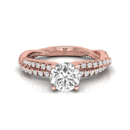 Round cut lab grown diamond engagement ring with twisted pavé diamond crossover band in rose gold.