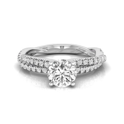 Round cut lab grown diamond engagement ring with twisted pavé diamond crossover band in white gold.