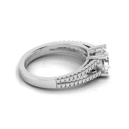 Round cut lab grown diamond engagement ring featuring a 1.28 carat center diamond in a four-prong setting with a pavé split shank and polished white gold finish.
