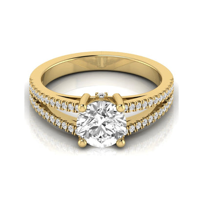 Round cut lab grown diamond engagement ring featuring a 1.28 carat center diamond in a four-prong setting with a pavé split shank and polished yellow gold finish.