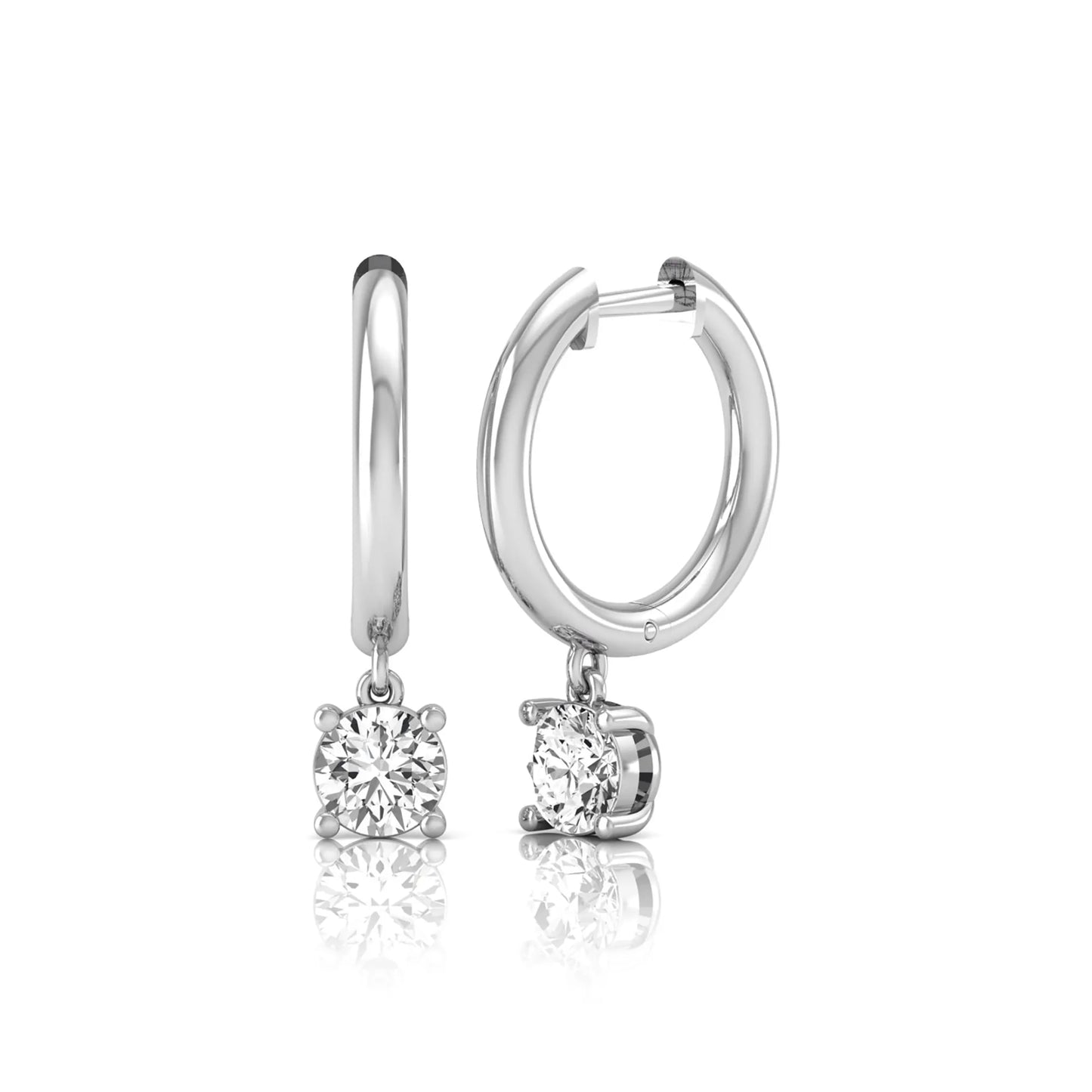 Round cut lab grown diamond drop huggie hoop earrings featuring a four prong drop setting, hinged snap closure, and polished white gold tone finish.