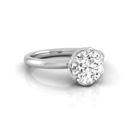 Round cut lab grown diamond solitaire engagement ring featuring a 2.04 carat IGI certified center diamond in a flower-inspired six-prong setting with a white gold design.