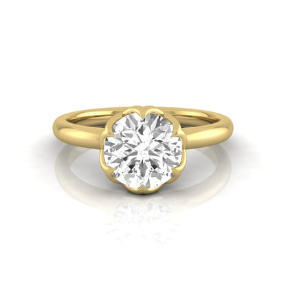 Round cut lab grown diamond solitaire engagement ring featuring a 2.04 carat IGI certified center diamond in a flower-inspired six-prong setting with a yellow gold design.