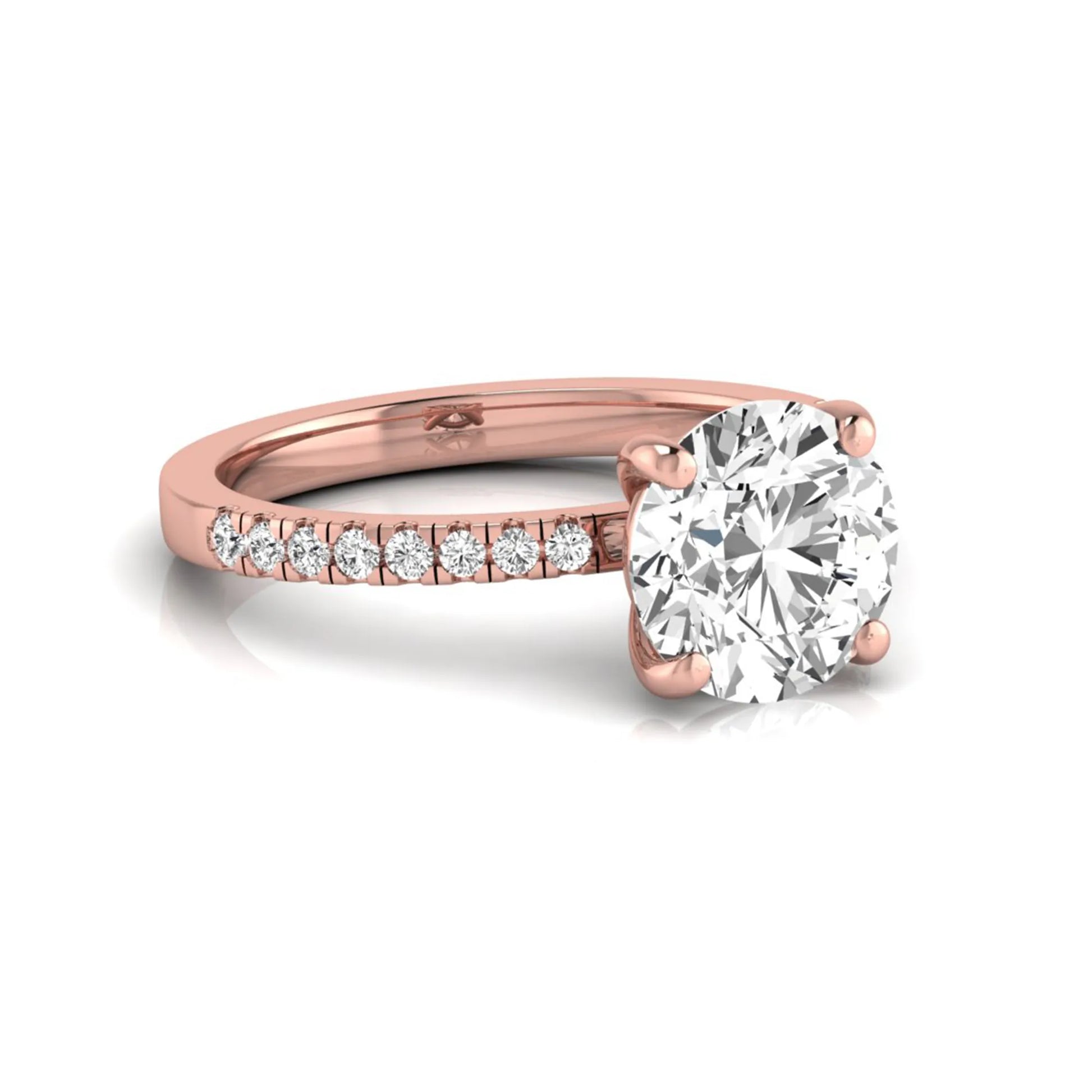 Round channel set lab grown diamond three stone ring with rose gold metal tone and modern geometric design.