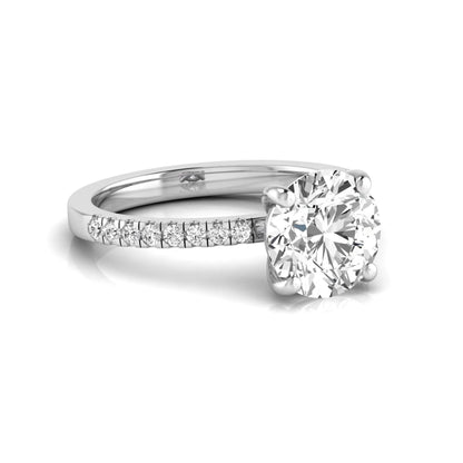 Round channel set lab grown diamond three stone ring with white gold metal tone and modern geometric design.