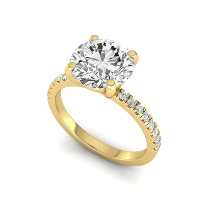 Round channel set lab grown diamond three stone ring with yellow gold metal tone and modern geometric design.