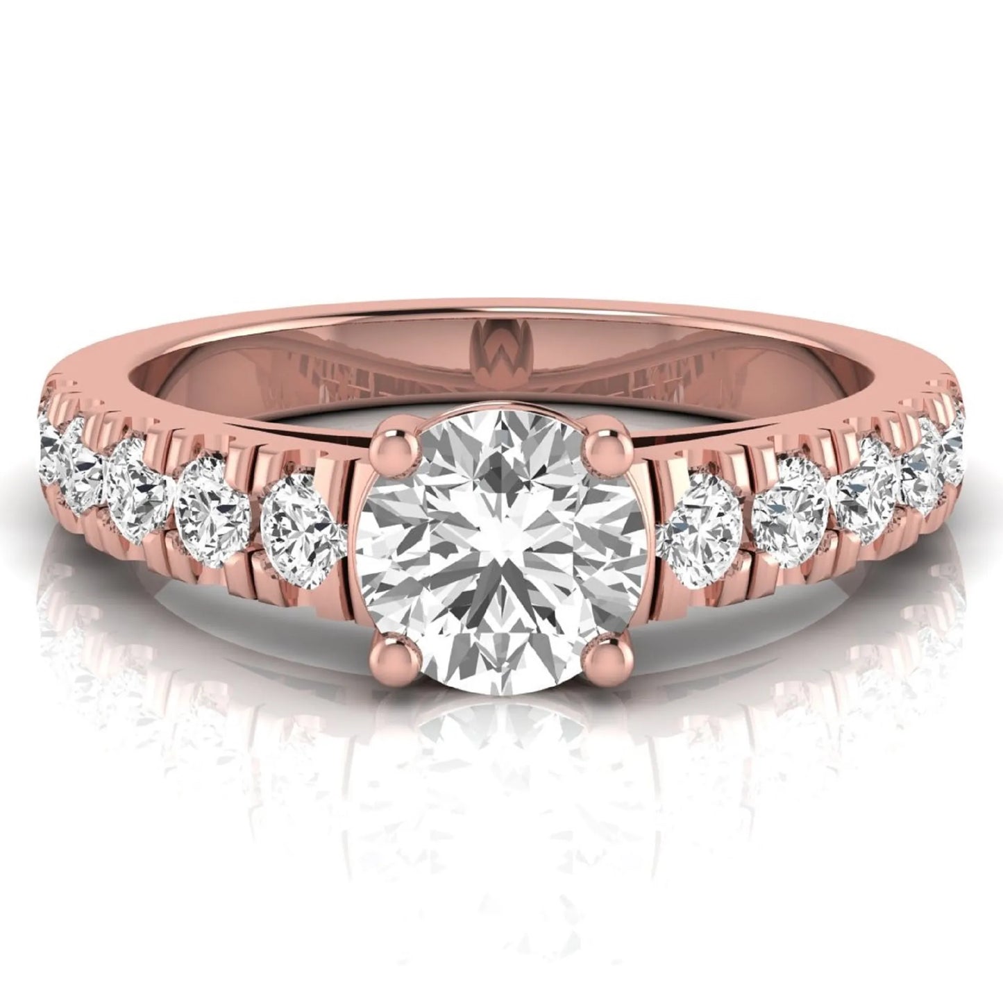 Round cut lab grown diamond side stone engagement ring featuring a four-prong setting with round accent diamonds in a rose gold tone design.