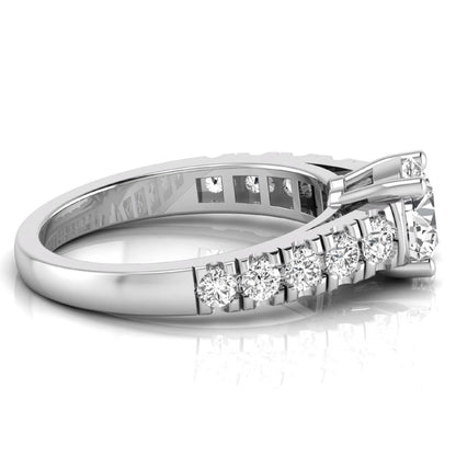 Round cut lab grown diamond side stone engagement ring featuring a four-prong setting with round accent diamonds in a white gold tone design.