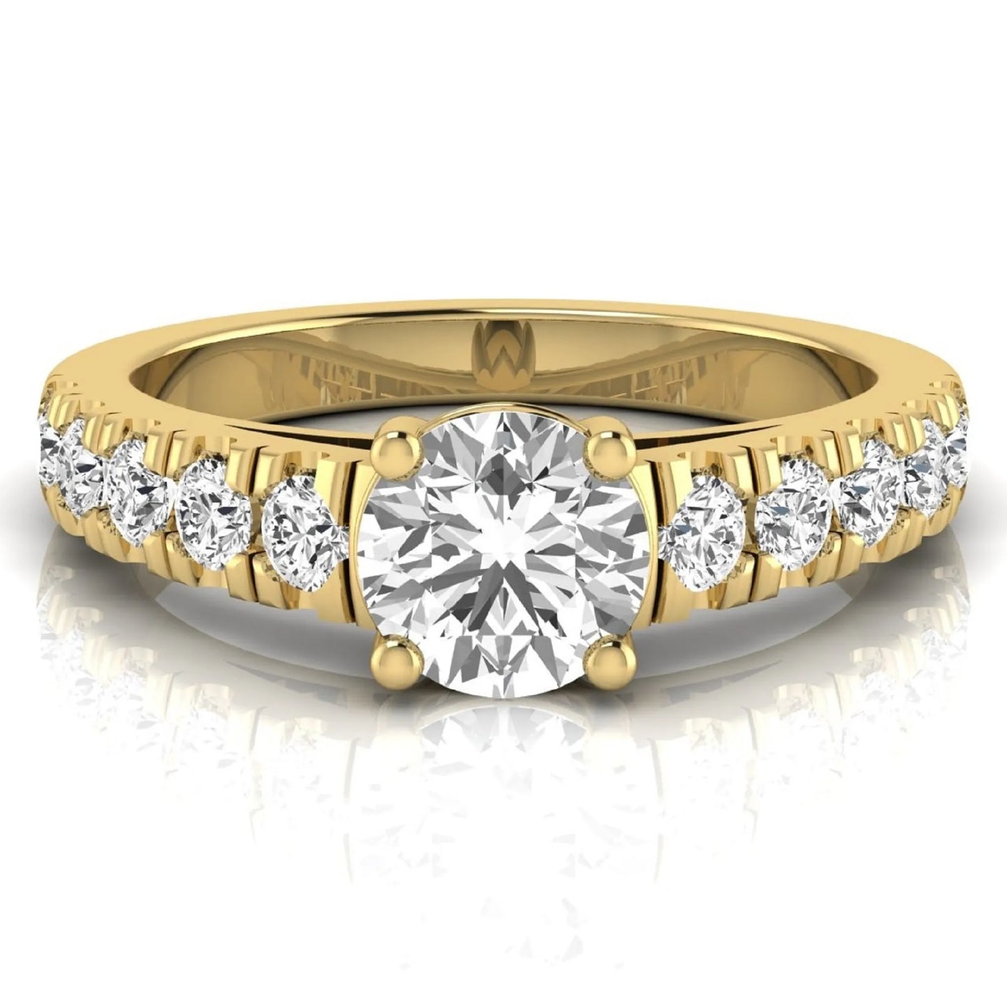 Round cut lab grown diamond side stone engagement ring featuring a four-prong setting with round accent diamonds in a yellow gold tone design.