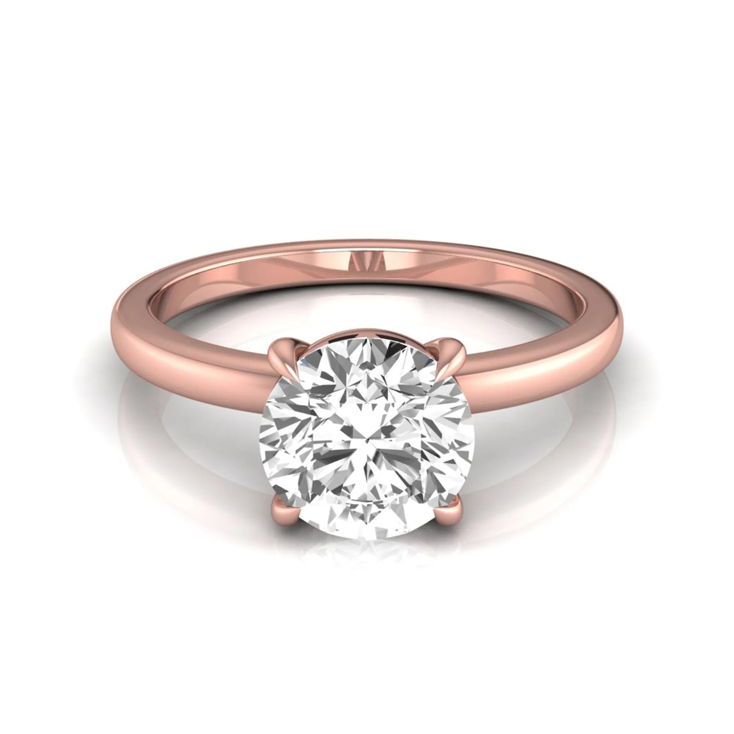 Round cut lab grown diamond solitaire engagement ring featuring a classic four-prong setting with a rose gold tone band.