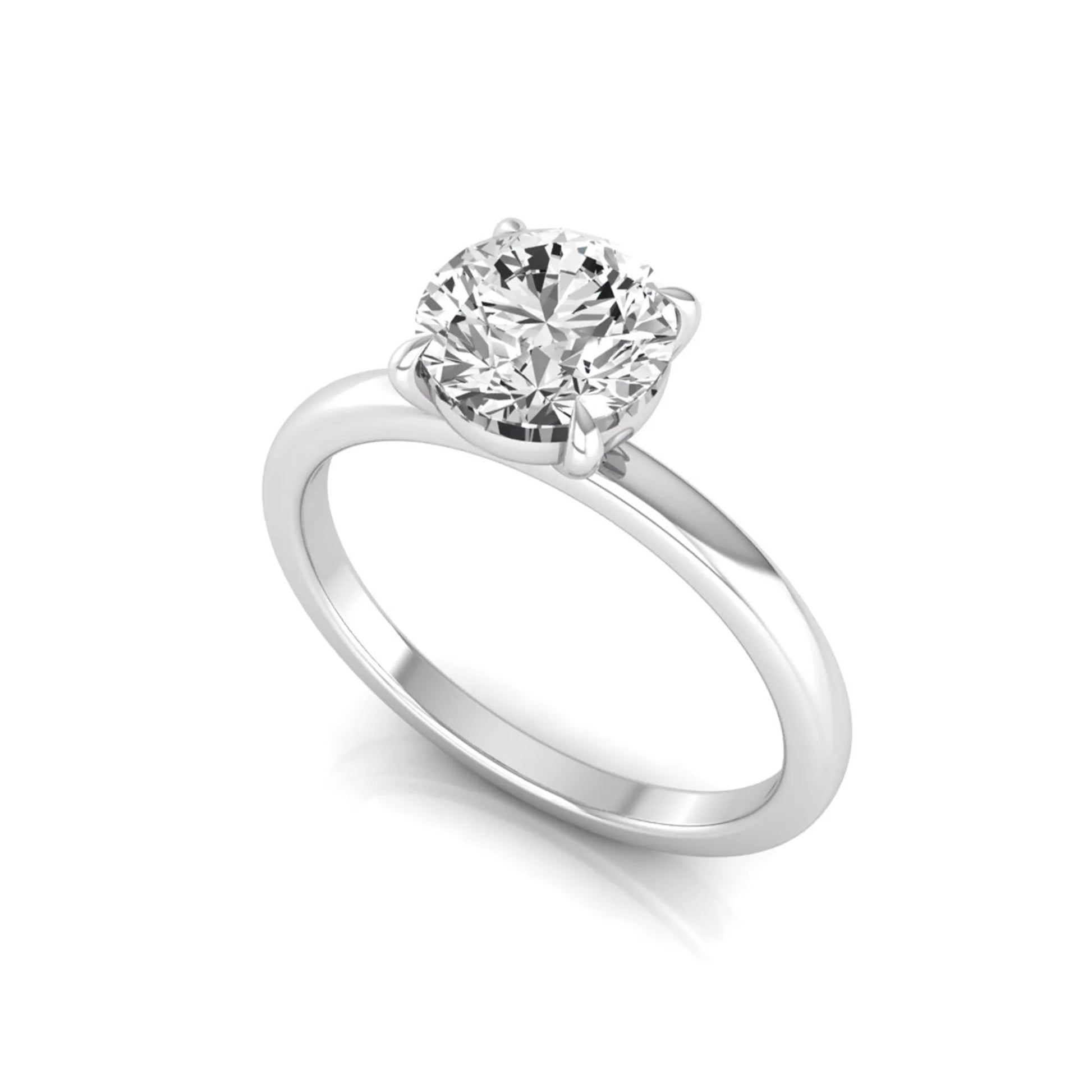 Round cut lab grown diamond solitaire engagement ring featuring a classic four-prong setting with a white gold tone band.
