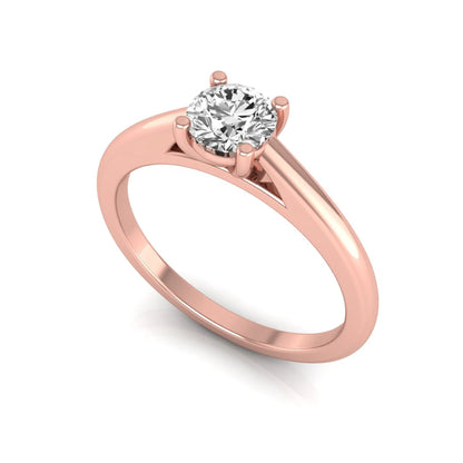 Round cut lab grown diamond solitaire engagement ring featuring a classic four-prong setting with a rose gold tone band.