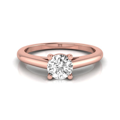 Round cut lab grown diamond solitaire engagement ring featuring a classic four-prong setting with a rose gold tone band.