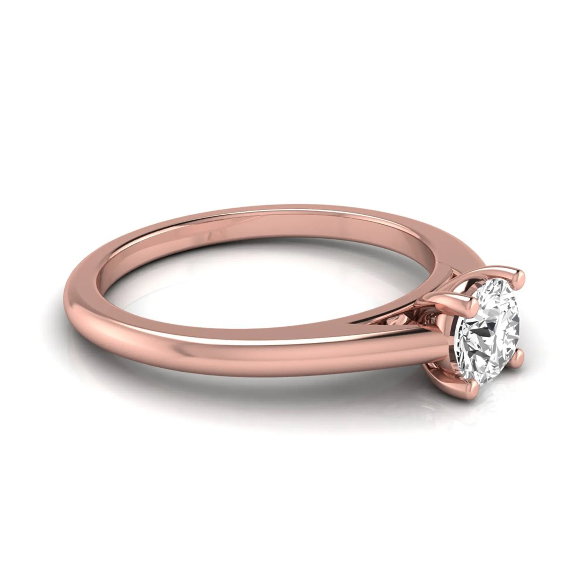 Round cut lab grown diamond solitaire engagement ring featuring a classic four-prong setting with a rose gold tone band.