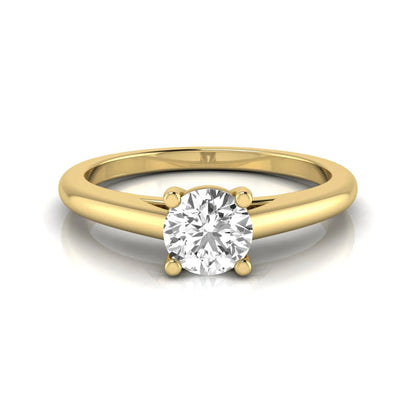 Round cut lab grown diamond solitaire engagement ring featuring a classic four-prong setting with a yellow gold tone band.