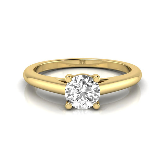 Round cut lab grown diamond solitaire engagement ring featuring a classic four-prong setting with a yellow gold tone band.