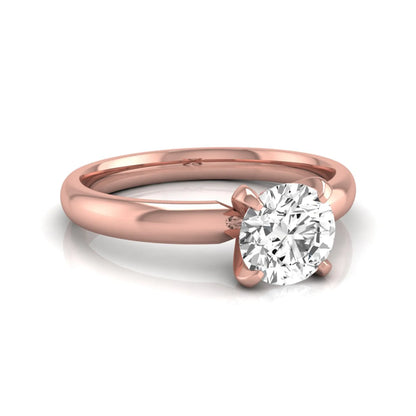 Round four prong lab grown diamond solitaire engagement ring featuring a 0.62 carat round center diamond in a classic four-prong setting in rose gold