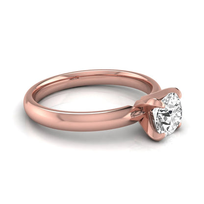 Round four prong lab grown diamond solitaire engagement ring featuring a 0.62 carat round center diamond in a classic four-prong setting in rose gold