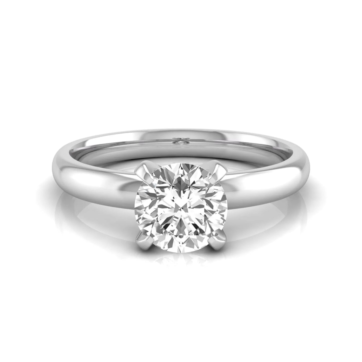 Round four prong lab grown diamond solitaire engagement ring featuring a 0.62 carat round center diamond in a classic four-prong setting in white gold