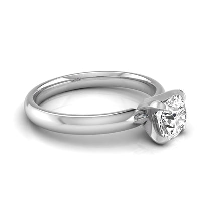 Round four prong lab grown diamond solitaire engagement ring featuring a 0.62 carat round center diamond in a classic four-prong setting in white gold