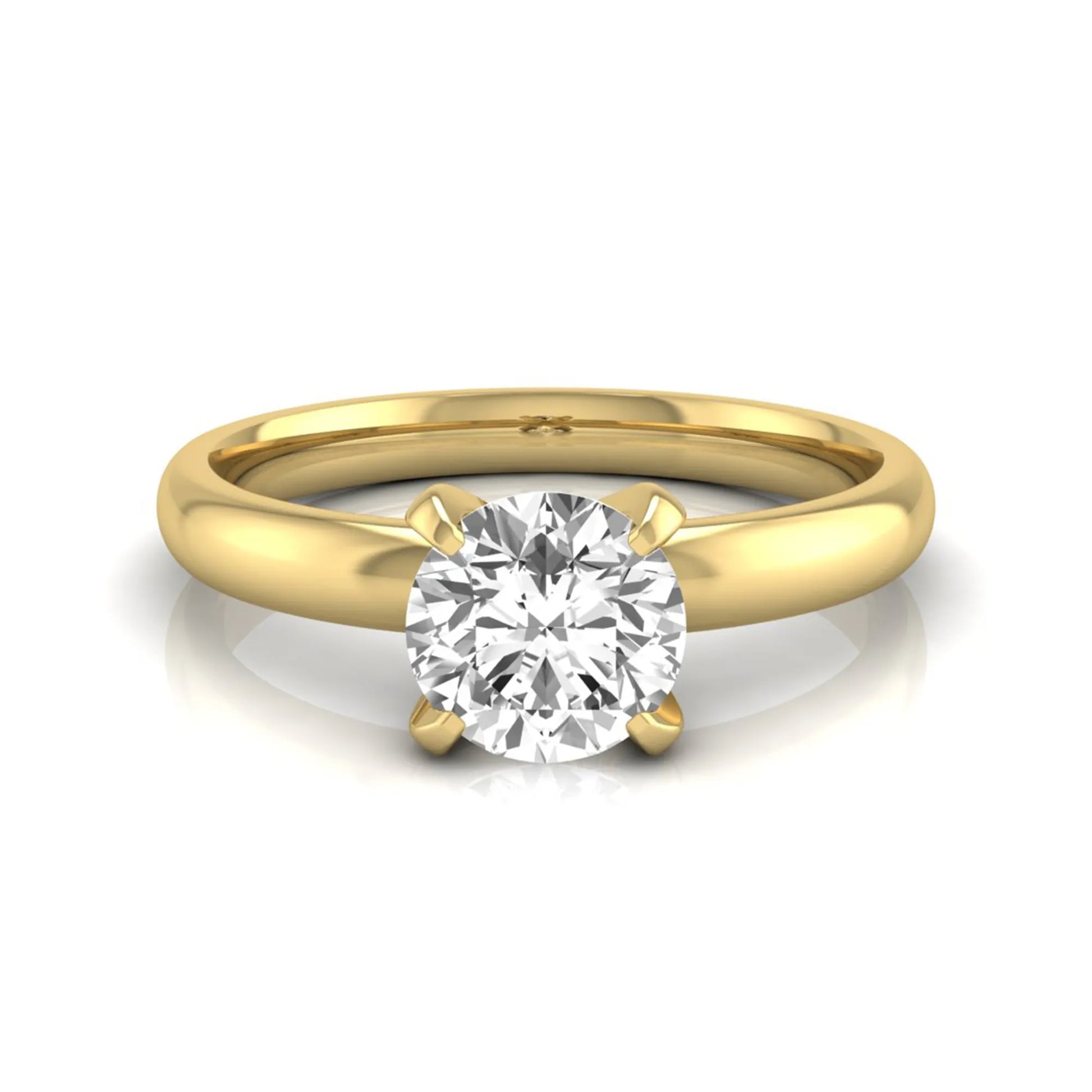 Round four prong lab grown diamond solitaire engagement ring featuring a 0.62 carat round center diamond in a classic four-prong setting in yellow gold