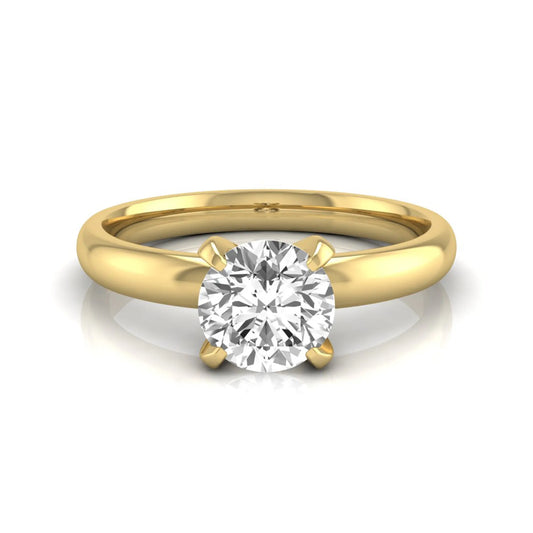Round four prong lab grown diamond solitaire engagement ring featuring a 0.62 carat round center diamond in a classic four-prong setting in yellow gold