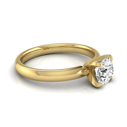 Round four prong lab grown diamond solitaire engagement ring featuring a 0.62 carat round center diamond in a classic four-prong setting in yellow gold