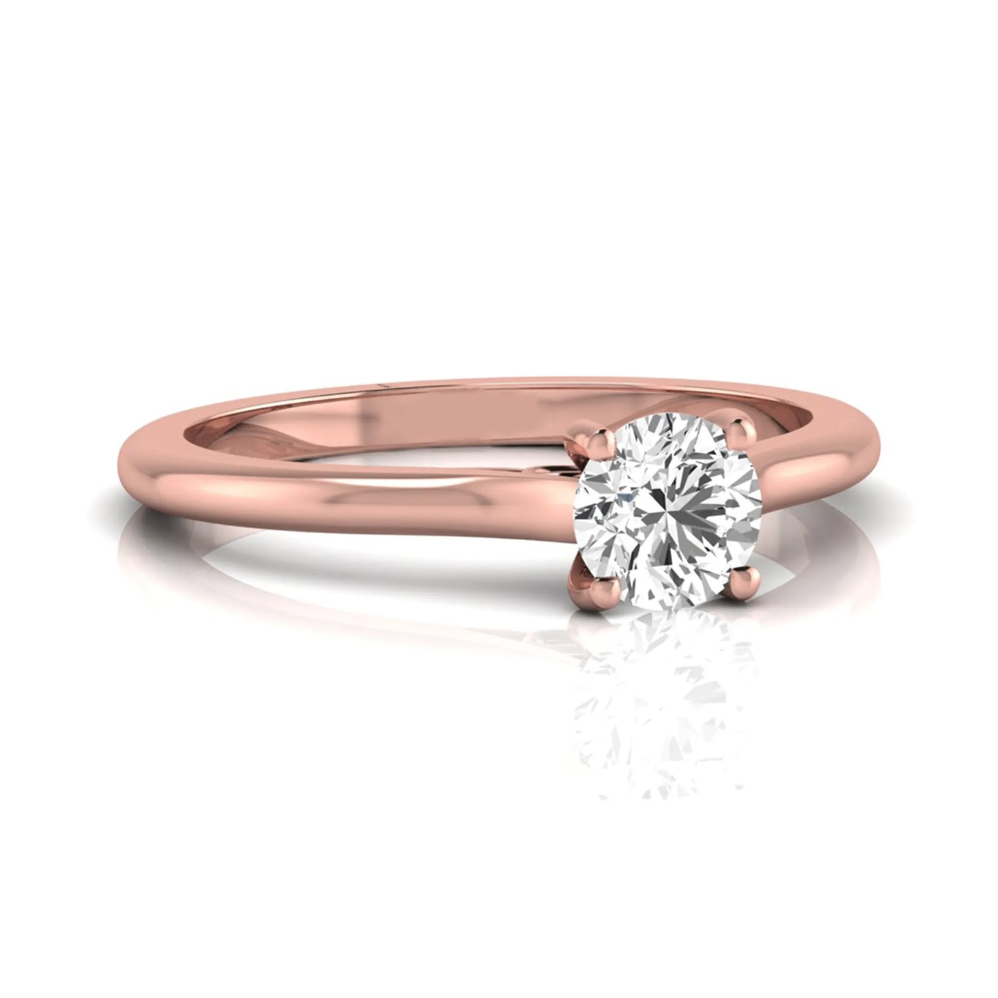Round four prong lab grown diamond solitaire engagement ring featuring a 0.60 carat round cut center diamond in a classic rose gold design.