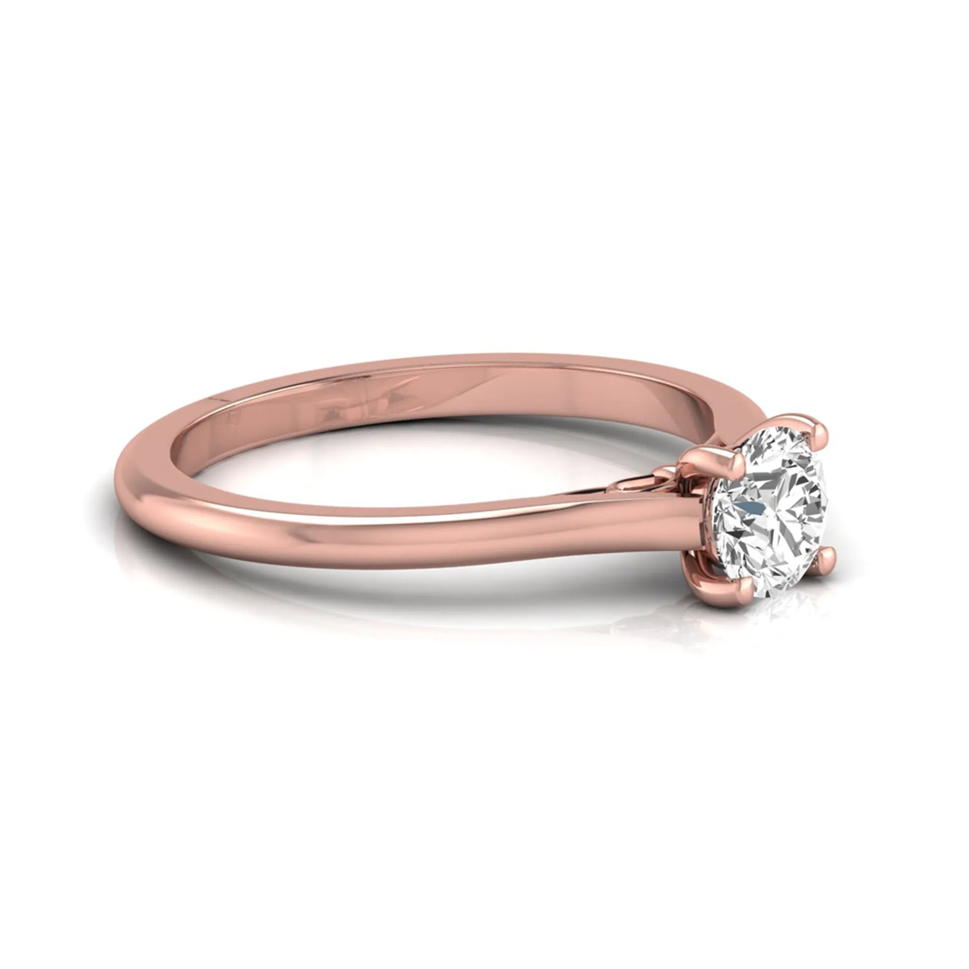 Round four prong lab grown diamond solitaire engagement ring featuring a 0.60 carat round cut center diamond in a classic rose gold design.