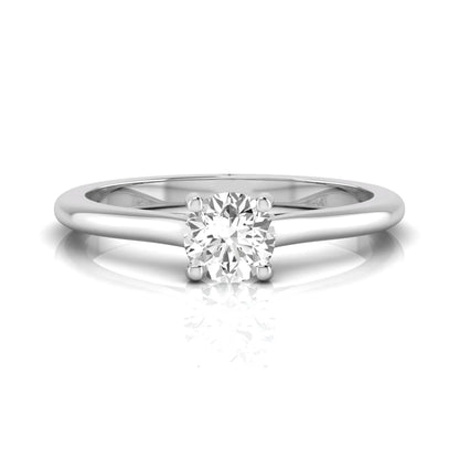 Round four prong lab grown diamond solitaire engagement ring featuring a 0.60 carat round cut center diamond in a classic white gold design.