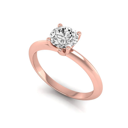 Round four prong lab grown diamond solitaire engagement ring featuring a 0.80 carat round cut center diamond in a classic rose gold design.