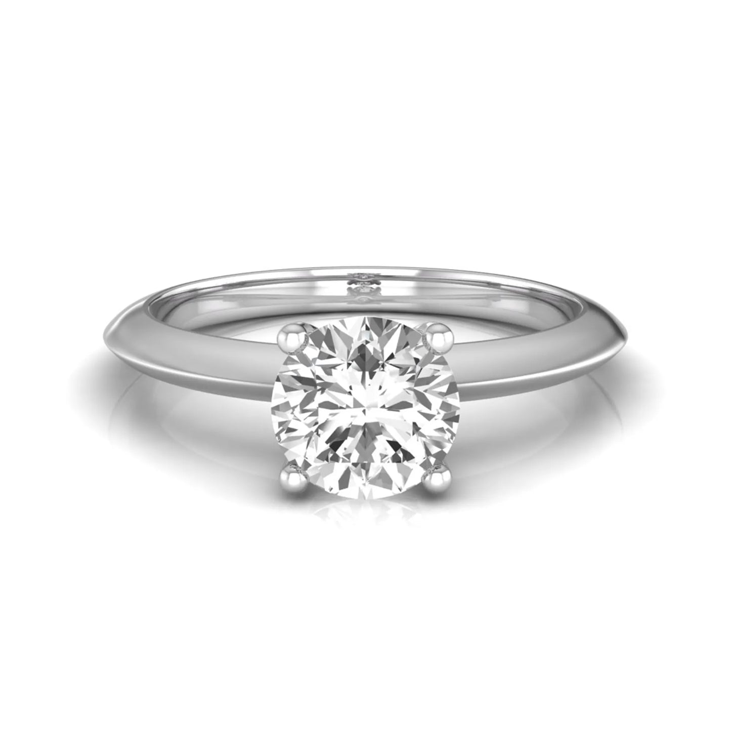 Round four prong lab grown diamond solitaire engagement ring featuring a 0.80 carat round cut center diamond in a classic white gold design.