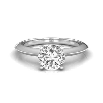 Round four prong lab grown diamond solitaire engagement ring featuring a 0.80 carat round cut center diamond in a classic white gold design.