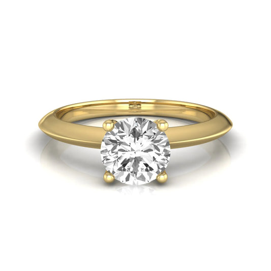 Round four prong lab grown diamond solitaire engagement ring featuring a 0.80 carat round cut center diamond in a classic yellow gold design.