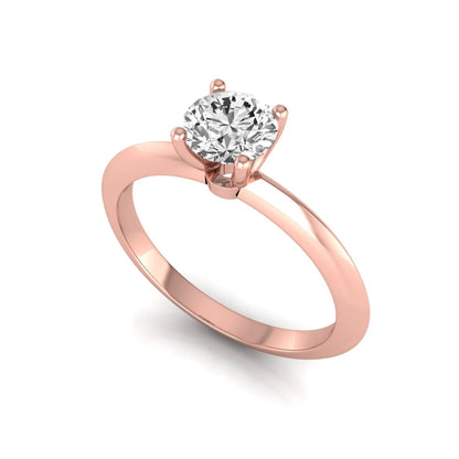 Round four prong lab grown diamond solitaire engagement ring featuring a 0.55 carat round cut center diamond in a classic rose gold design.
