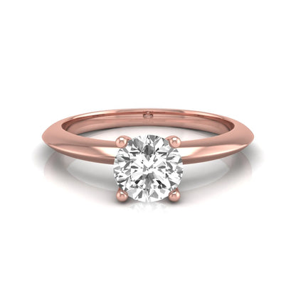 Round four prong lab grown diamond solitaire engagement ring featuring a 0.55 carat round cut center diamond in a classic rose gold design.