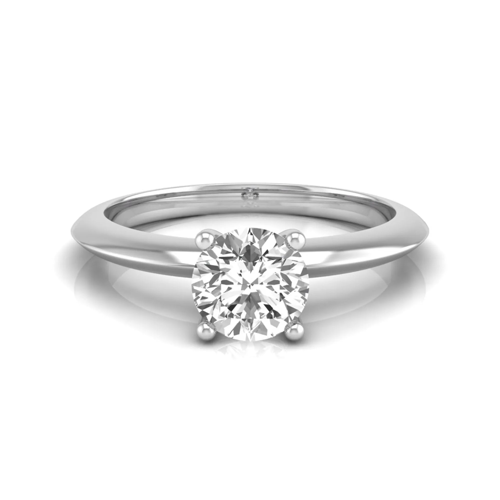 Round four prong lab grown diamond solitaire engagement ring featuring a 0.55 carat round cut center diamond in a classic white gold design.