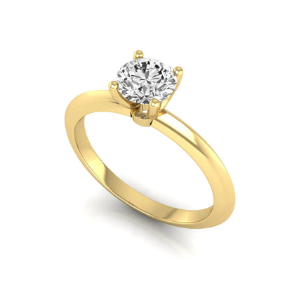 Round four prong lab grown diamond solitaire engagement ring featuring a 0.55 carat round cut center diamond in a classic yellow gold design.