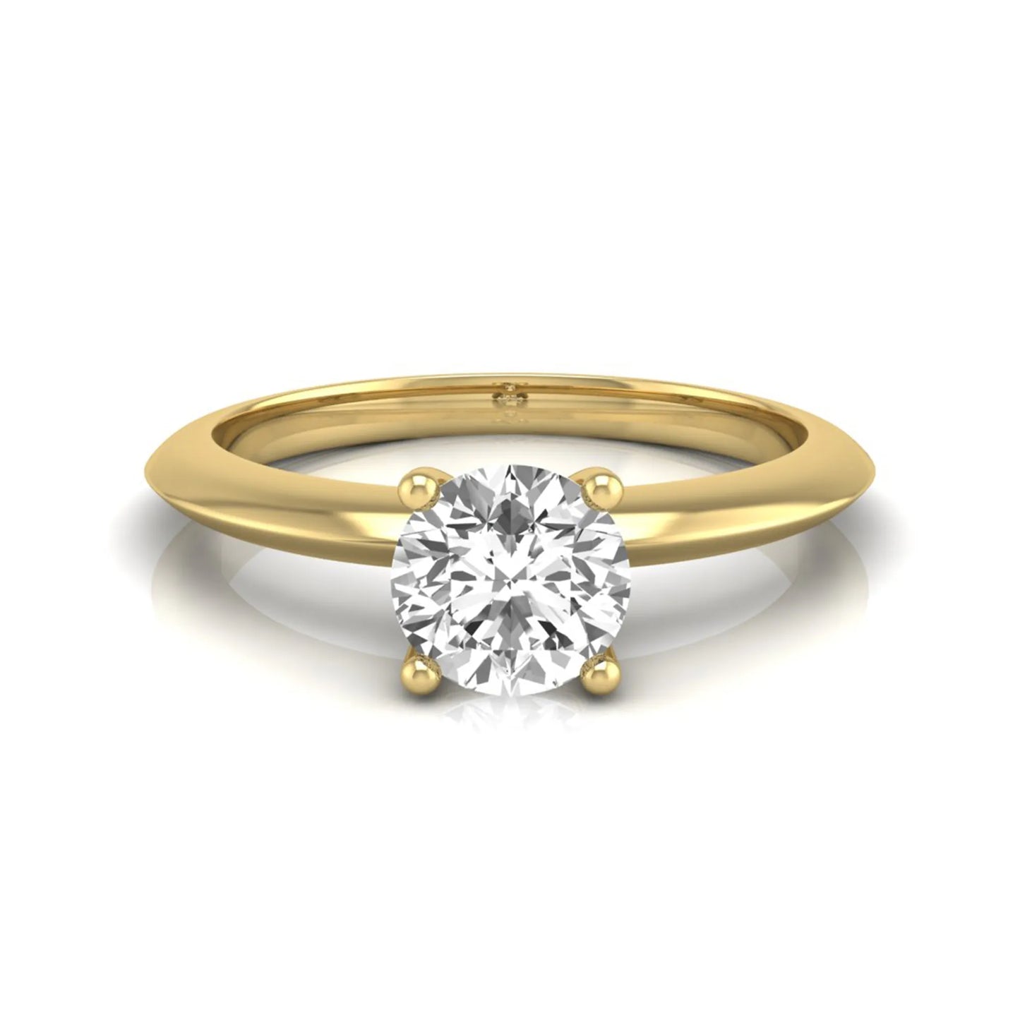 Round four prong lab grown diamond solitaire engagement ring featuring a 0.55 carat round cut center diamond in a classic yellow gold design.