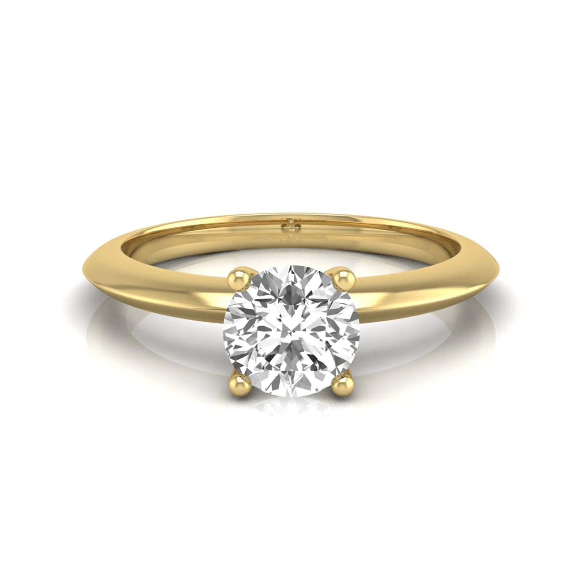 Round four prong lab grown diamond solitaire engagement ring featuring a 0.55 carat round cut center diamond in a classic yellow gold design.