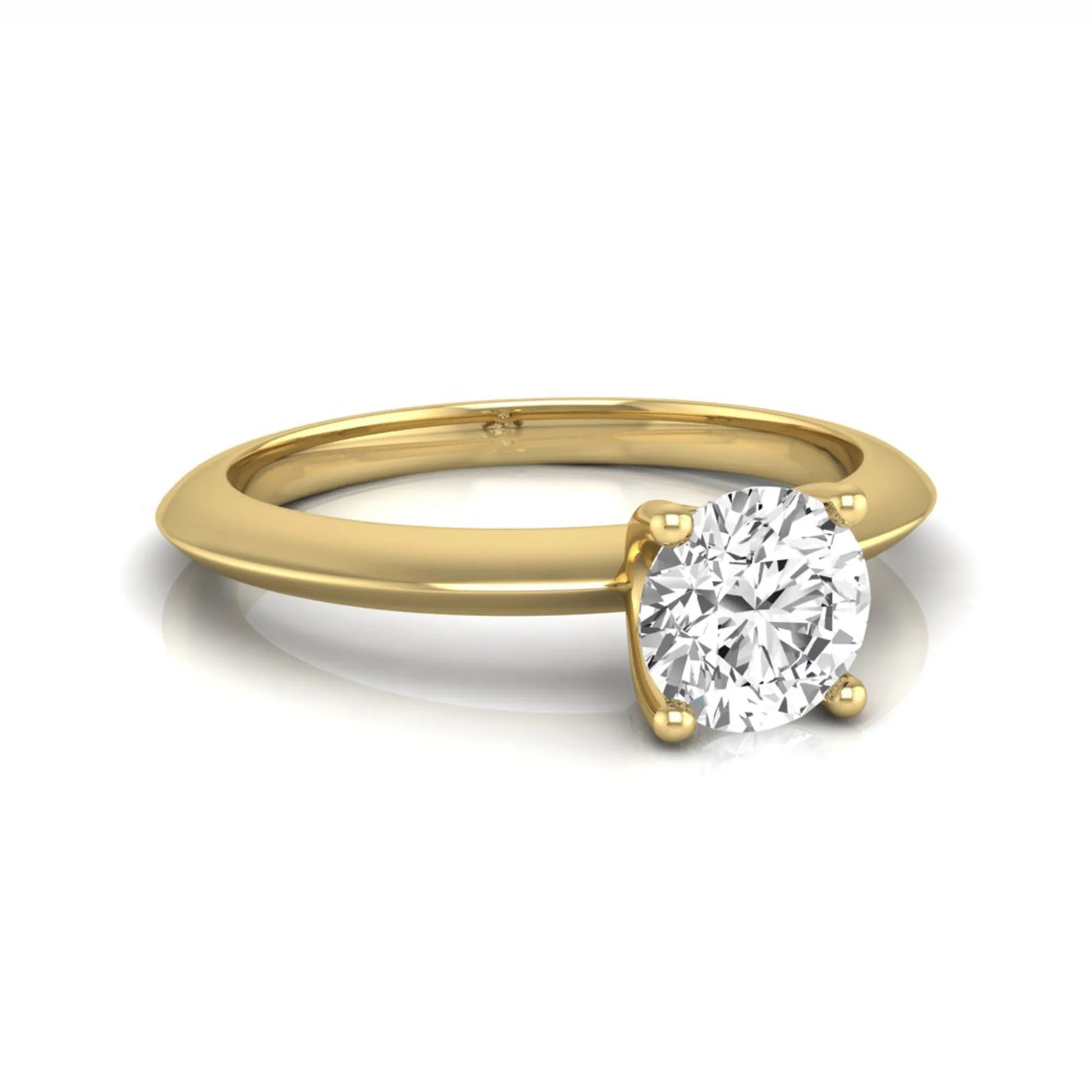 Round four prong lab grown diamond solitaire engagement ring featuring a 0.55 carat round cut center diamond in a classic yellow gold design.